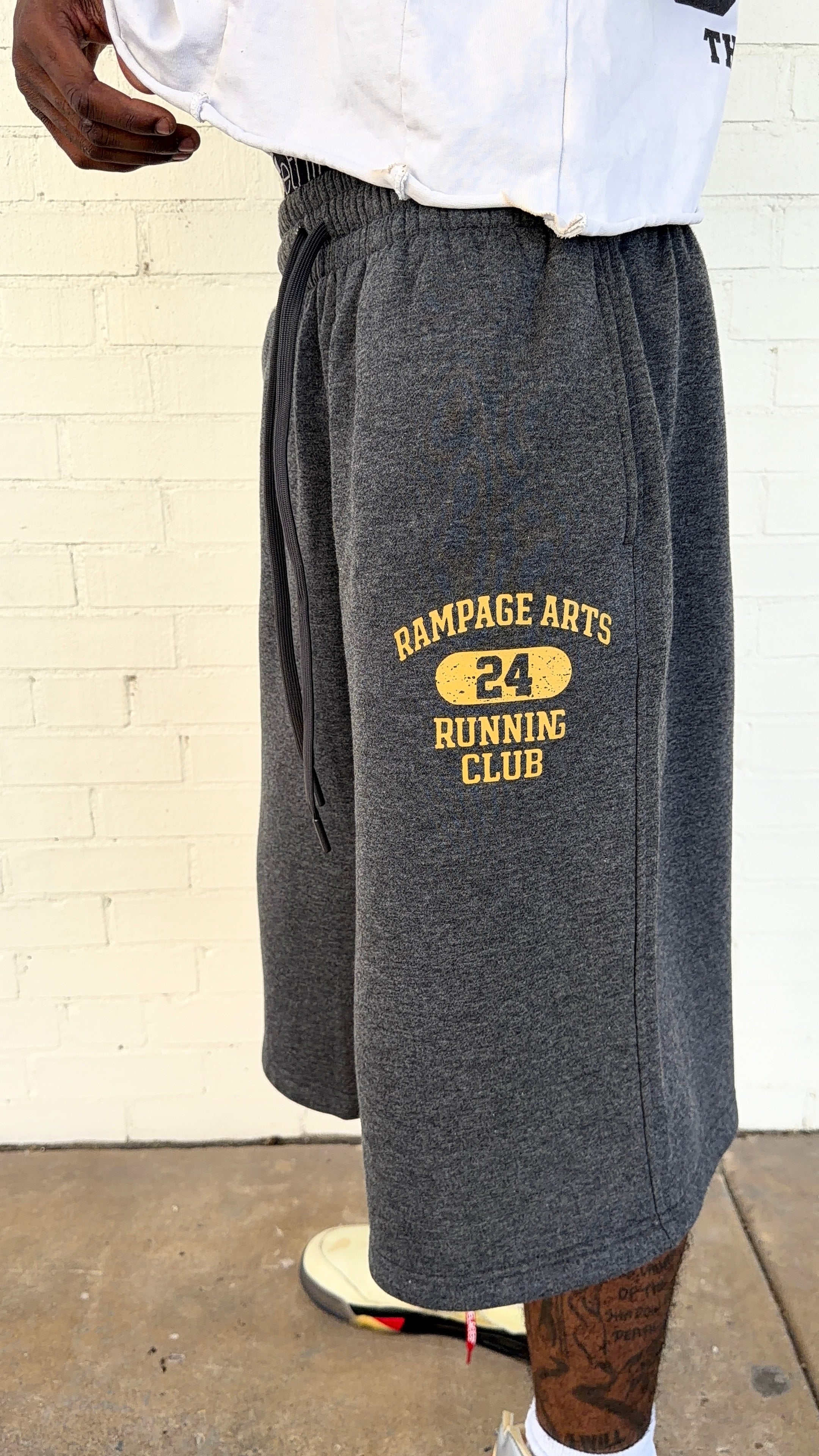Yellow 3/4 Running Club Shorts